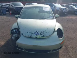 2009 Volkswagen Beetle S with VIN 3VWRW31C29M501964, listed as a IAAI auction lot 42388544 with 99,674 mi miles and . Bid and sale history available at DreamBid. Image 12.