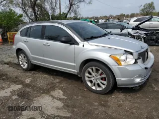 2011 Dodge Caliber Heat with VIN 1B3CB5HA6BD261566, listed as a Copart auction lot 50753435 with 137,632 mi miles and Salvage Title. Bid and sale history available at DreamBid. Image 4.