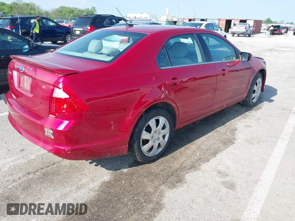 2011 Ford Fusion SE with VIN 3FAHP0HA9BR113305, listed as a IAAI auction lot 42112161 with 217,618 mi miles. Bid and sale history available at carsss.com. Image 4.