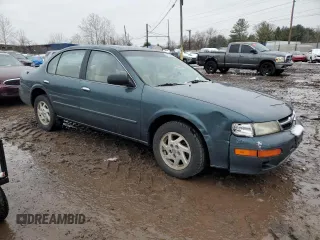 1998 Nissan Maxima GXE with VIN JN1CA21D1WT607137, listed as a Copart auction lot 43629285 with 159,196 mi miles and Salvage title. Bid and sale history available at DreamBid. Image 4.