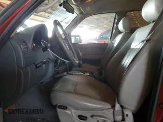 2007 Jeep Liberty Limited with VIN 1J8GL58K37W597251, listed as a Copart auction lot 52823045 with 227,191 mi miles and Salvage title. Bid and sale history available at DreamBid. Image 7.