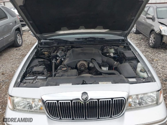 1999 Mercury Grand Marquis LS with VIN 2MEFM75W0XX670050, listed as a IAAI auction lot 41938610 with 65,460 mi miles. Bid and sale history available at carsss.com. Image 10.