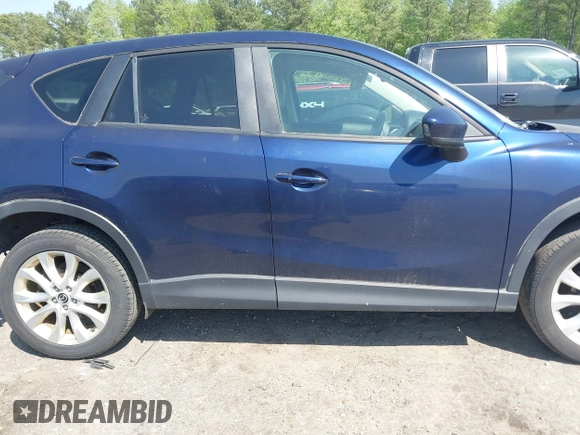 2014 Mazda CX-5 Grand Touring with VIN JM3KE4DYXE0342720, listed as a IAAI auction lot 42026388 with 114,072 mi miles and . Bid and sale history available at carsss.com. Image 14.