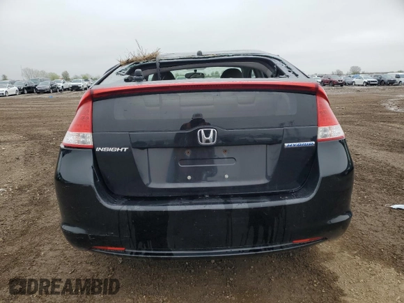 2010 Honda Insight LX with VIN JHMZE2H56AS022299, listed as a Copart auction lot 54872215 with 149,514 mi miles and Salvage title. Bid and sale history available at DreamBid. Image 6.