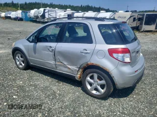 2009 Suzuki SX4 Man AWD with VIN JS2YB413196204559, listed as a Copart auction lot 61994234 with 180,757 mi miles and Salvage Title. Bid and sale history available at carsss.com. Image 2.