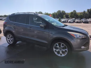 2013 Ford Escape Titanium with VIN 1FMCU0J93DUA78278, listed as a Copart auction lot 63519845 with 141,874 mi miles and Salvage title. Bid and sale history available at DreamBid. Image 4.