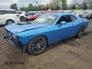 2016 Dodge Challenger 392 Hemi Scat Pack Shaker z VIN 2C3CDZFJ3GH172443, wystawiony jako Copart lot #56125045 z przebiegiem 64 534 mil mil oraz Szkoda całkowita • Salvage title. Historia ofert i sprzedaży dostępna na DreamBid. Obrazek 1.