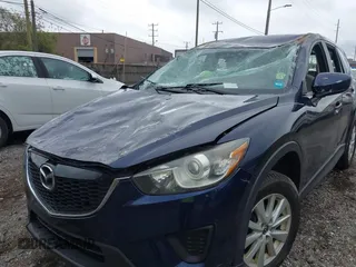 2013 Mazda CX-5 Sport with VIN JM3KE2BE1D0160254, listed as a IAAI auction lot 42256555 with 136,476 mi miles and . Bid and sale history available at DreamBid. Image 6.