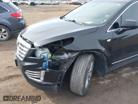 2019 Cadillac XT5 Luxury AWD with VIN 1GYKNDRS5KZ172975, listed as a IAAI auction lot 41814397 with 63,563 mi miles and . Bid and sale history available at carsss.com. Image 6.