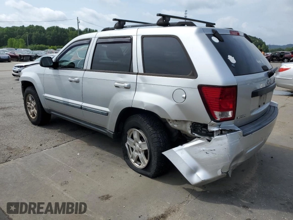 2007 Jeep Grand Cherokee Laredo with VIN 1J8GS48K77C575560, listed as a Copart auction lot 65741354 with 150,062 mi miles and Salvage Title. Bid and sale history available at carsss.com. Image 2.