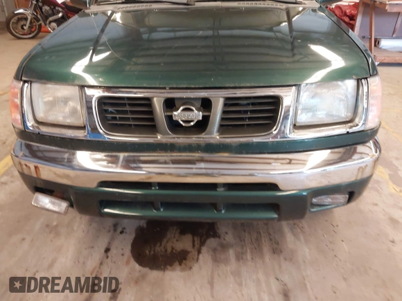 2000 Nissan Frontier XE with VIN 1N6ED26Y4YC354551, listed as a IAAI auction lot 42865110 with 116,193 mi miles and . Bid and sale history available at DreamBid. Image 13.