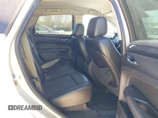 2013 Cadillac SRX z VIN 3GYFNAE33DS654844, wystawiony jako IAAI lot #41765013 z przebiegiem 117 616 mil mil oraz . Historia ofert i sprzedaży dostępna na DreamBid. Obrazek 8.
