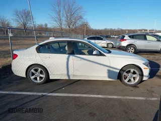 2014 BMW 3 Series 328i xDrive with VIN WBA3B5G58ENS08415, listed as a IAAI auction lot 41642668 with 51,563 mi miles and . Bid and sale history available at DreamBid. Image 13.