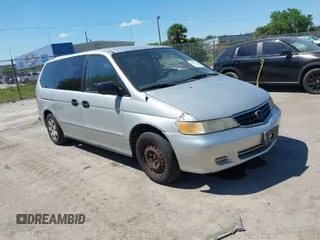 2002 Honda Odyssey LX z VIN 2HKRL18522H530187, wystawiony jako IAAI lot #41875957 z przebiegiem 212 128 mil mil oraz . Historia ofert i sprzedaży dostępna na DreamBid. Obrazek 1.