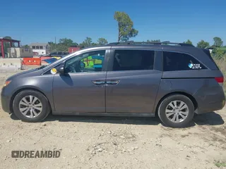 2015 Honda Odyssey EX-L with VIN 5FNRL5H61FB048170, listed as a IAAI auction lot 41822798 with 179,550 mi miles and . Bid and sale history available at DreamBid. Image 14.