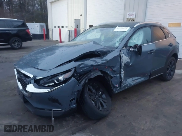 2023 Mazda CX-30 S Carbon Edition with VIN 3MVDMBCM5PM545150, listed as a IAAI auction lot 41104881 with 30,459 mi miles and . Bid and sale history available at DreamBid. Image 2.