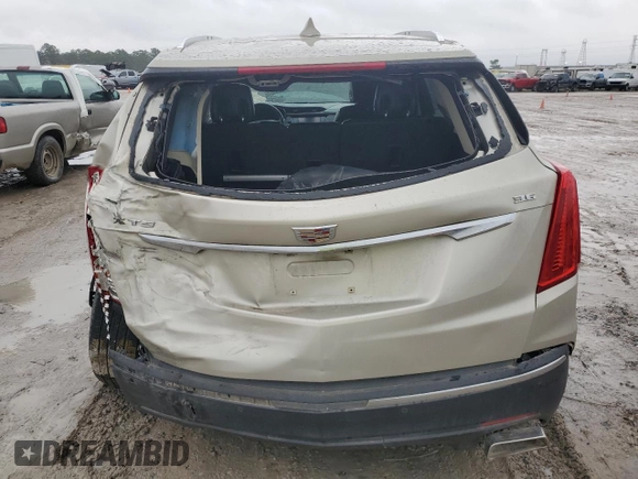 2017 Cadillac XT5 Luxury FWD with VIN 1GYKNBRS5HZ123174, listed as a Copart auction lot 43193045 with 96,617 mi miles and Salvage Title. Bid and sale history available at DreamBid. Image 6.