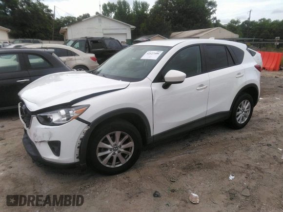 2014 Mazda CX-5 Touring z VIN JM3KE4CY0E0303748, wystawiony jako IAAI lot #42127406 z przebiegiem Nie podano mil oraz . Historia ofert i sprzedaży dostępna na DreamBid. Obrazek 16.