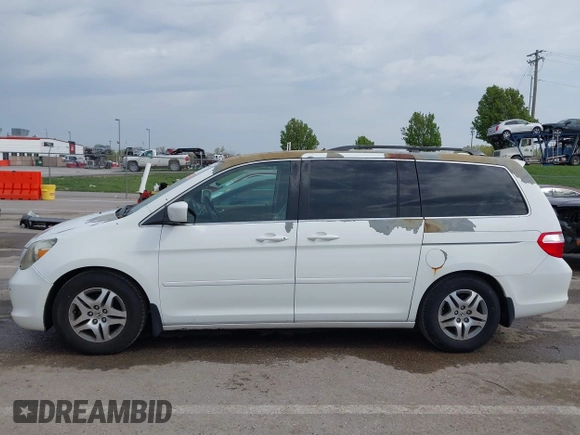 2007 Honda Odyssey Touring with VIN 5FNRL38887B081562, listed as a IAAI auction lot 42000435 with 238,287 mi miles and . Bid and sale history available at DreamBid. Image 15.