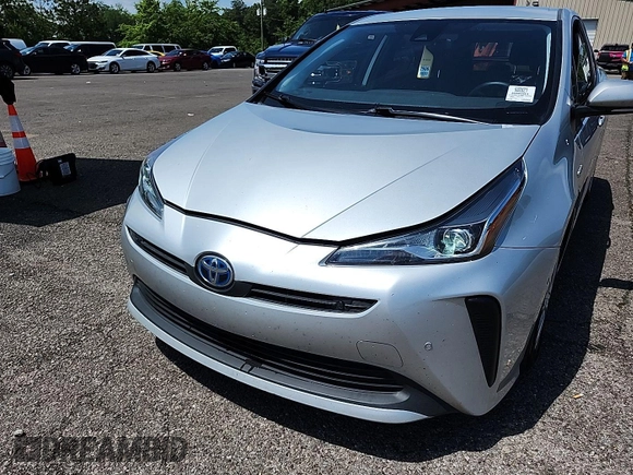 2021 Toyota Prius L Eco with VIN JTDKAMFU4M3144050, listed as a IAAI auction lot 42774220 with 173,180 mi miles and . Bid and sale history available at DreamBid. Image 7.