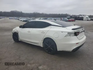 2019 Nissan Maxima Platinum z VIN 1N4AA6AV5KC373153, wystawiony jako Copart lot #43813565 z przebiegiem 106 698 mil mil oraz Szkody całkowita. Historia ofert i sprzedaży dostępna na DreamBid. Obrazek 2.