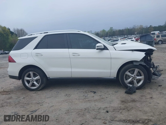 2017 Mercedes-Benz GLE 350 z VIN 4JGDA5JB4HA955963, wystawiony jako IAAI lot #41934855 z przebiegiem 151 147 mil mil oraz . Historia ofert i sprzedaży dostępna na DreamBid. Obrazek 14.