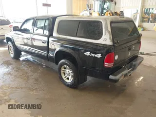 2004 Dodge Dakota Sport with VIN 1D7HG38N24S501391, listed as a IAAI auction lot 41736751 with 213,299 mi miles and . Bid and sale history available at carsss.com. Image 3.