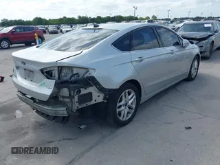 2015 Ford Fusion SE with VIN 3FA6P0H70FR141768, listed as a IAAI auction lot 42085851 with 134,844 mi miles. Bid and sale history available at carsss.com. Image 4.