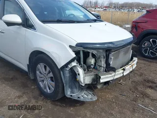 2014 Honda Odyssey EX-L with VIN 5FNRL5H63EB136541, listed as a IAAI auction lot 41866320 with 148,696 mi miles and . Bid and sale history available at DreamBid. Image 18.