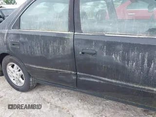 1997 Toyota Camry LE z VIN 4T1BG22K8VU004288, wystawiony jako IAAI lot #42358520 z przebiegiem 273 047 mil mil oraz . Historia ofert i sprzedaży dostępna na DreamBid. Obrazek 6.