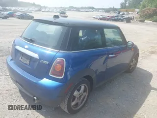 2008 MINI Hardtop with VIN WMWMF33538TT65479, listed as a IAAI auction lot 42489393 with 114,520 mi miles and . Bid and sale history available at DreamBid. Image 4.