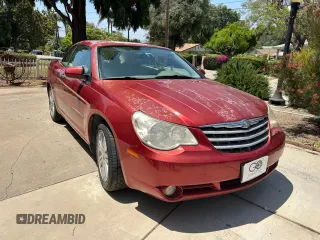 2008 Chrysler Sebring Limited z VIN 1C3LC65M98N197109, wystawiony jako Copart lot #58816155 z przebiegiem 76 731 mil mil oraz Tytuł czysty. Historia ofert i sprzedaży dostępna na DreamBid. Obrazek 1.