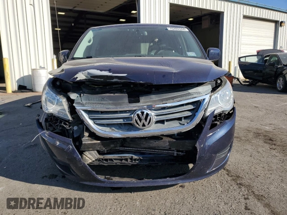 2014 Volkswagen Routan SE with VIN 2C4RVABG7ER134462, listed as a Copart auction lot 76492444 with 93,373 mi miles and Salvage title. Bid and sale history available at DreamBid. Image 5.