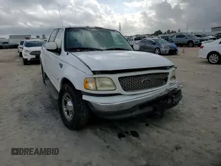 2001 Ford F-150 XLT with VIN 1FTRW07L01KC60815, listed as a Copart auction lot 87022424 with 205,304 mi miles and Salvage title. Bid and sale history available at DreamBid. Image 10.