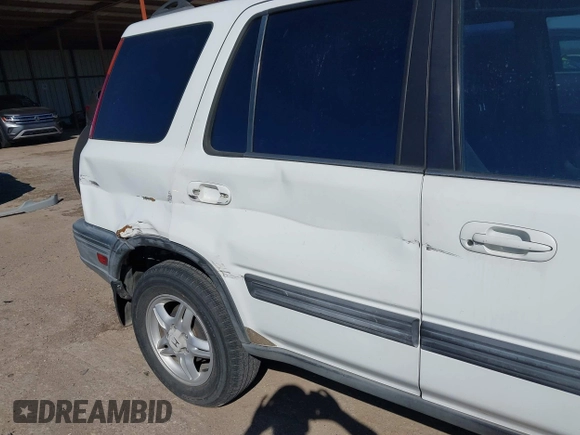 2000 Honda CR-V EX with VIN JHLRD1869YS000284, listed as a IAAI auction lot 41735106 with 160,956 mi miles. Bid and sale history available at carsss.com. Image 6.