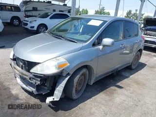 2009 Nissan Versa S с VIN 3N1BC13E99L453758, выставлен на аукционе IAAI как лот 42343658 с пробегом 218 825 миль миль и . История ставок и продаж доступна на DreamBid. Изображение 18.