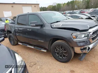 2019 Ram 1500 Big Horn z VIN 1C6RREFT7KN522858, wystawiony jako IAAI lot #41938140 z przebiegiem 115 165 mil mil oraz . Historia ofert i sprzedaży dostępna na DreamBid. Obrazek 1.
