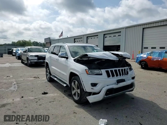 2015 Jeep Grand Cherokee Overland with VIN 1C4RJFCGXFC891616, listed as a Copart auction lot 61386065 with 90,011 mi miles and Salvage title. Bid and sale history available at DreamBid. Image 14.