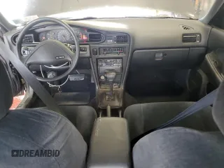 1990 Nissan Maxima с VIN JN1HJ01P3LT420451, выставлен на аукционе Copart как лот 60822275 с пробегом 146 196 миль миль и Списание • Salvage title. История ставок и продаж доступна на DreamBid. Изображение 8.