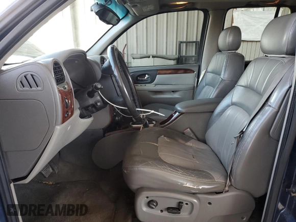 2004 GMC Envoy SLE with VIN 1GKDT13S142201271, listed as a Copart auction lot 50249705 with 248,364 mi miles and Salvage Title. Bid and sale history available at carsss.com. Image 7.