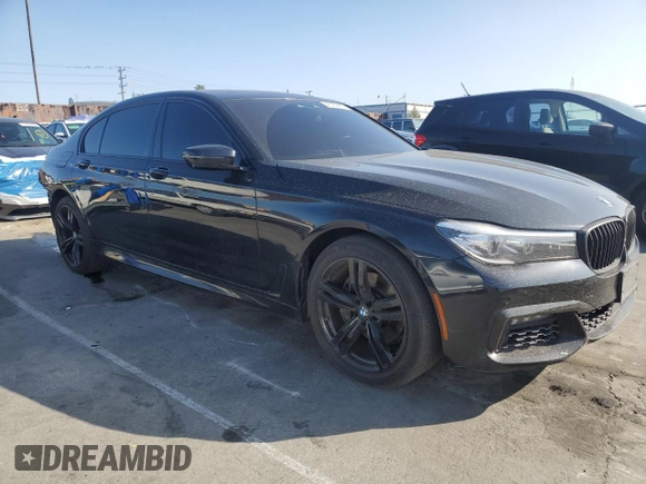 2016 BMW 7 Series 740i с VIN WBA7E2C54GG504200, выставлен на аукционе Copart как лот 46369885 с пробегом 70 606 миль миль и Списание • Salvage title. История ставок и продаж доступна на DreamBid. Изображение 4.