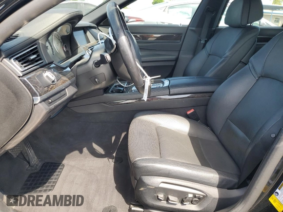 2013 BMW 7 Series 740i with VIN WBAYA6C58DC994974, listed as a Copart auction lot 55534645 with 106,975 mi miles and Salvage title. Bid and sale history available at DreamBid. Image 7.