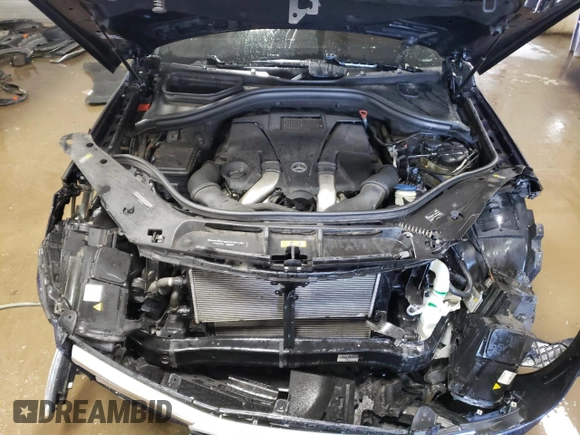 2014 Mercedes-Benz GL 450 z VIN 4JGDF7CE9EA345301, wystawiony jako Copart lot #49129005 z przebiegiem 120 981 mil mil oraz Szkoda całkowita • Salvage title. Historia ofert i sprzedaży dostępna na DreamBid. Obrazek 11.