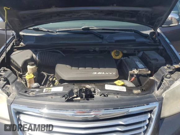 2014 Chrysler Town & Country Touring L 30th Anniversary with VIN 2C4RC1CG9ER341116, listed as a Copart auction lot 54783705 with 188,355 mi miles and Clean Title. Bid and sale history available at DreamBid. Image 12.