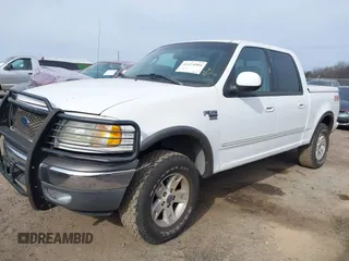 2003 Ford F-150 XLT with VIN 1FTRW08L73KA73945, listed as a IAAI auction lot 41474904 with 122,080 mi miles. Bid and sale history available at carsss.com. Image 18.