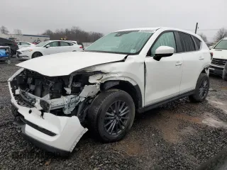 2021 Mazda CX-5 Touring z VIN JM3KFBCM8M0493778, wystawiony jako Copart lot #85006644 z przebiegiem 53 522 mil mil oraz Szkoda całkowita • Salvage title. Historia ofert i sprzedaży dostępna na DreamBid. Obrazek 1.