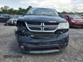 2017 Dodge Journey SXT with VIN 3C4PDCBB9HT576994, listed as a Copart auction lot 60420175 with 115,257 mi miles and Salvage title. Bid and sale history available at DreamBid. Image 5.
