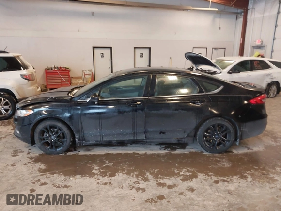 2019 Ford Fusion SE with VIN 3FA6P0HD3KR229021, listed as a IAAI auction lot 41576389 with 123,286 mi miles. Bid and sale history available at carsss.com. Image 14.
