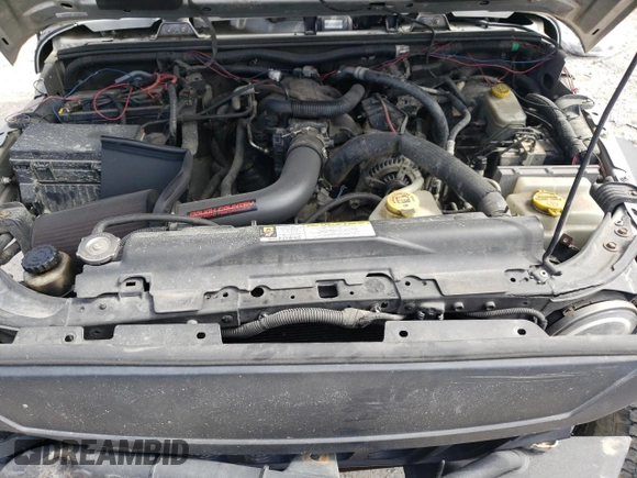 2008 Jeep Wrangler Sahara with VIN 1J4FA54148L561961, listed as a Copart auction lot 50770895 with 126,516 mi miles and Salvage title. Bid and sale history available at DreamBid. Image 14.