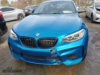 2017 BMW M2 with VIN WBS1H9C57HV886785, listed as a IAAI auction lot 41716752 with 63,388 mi miles. Bid and sale history available at carsss.com. Image 17.